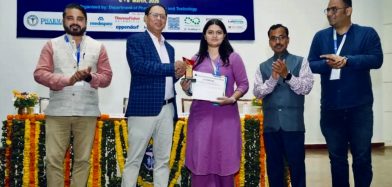 Best Oral Presentation Award to Ms. Dhruvee Patel