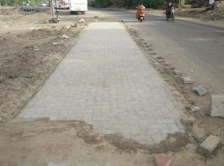 Fly Ash and Bottom Ash Based Cementless Paver Blocks for Rural Pavements of India