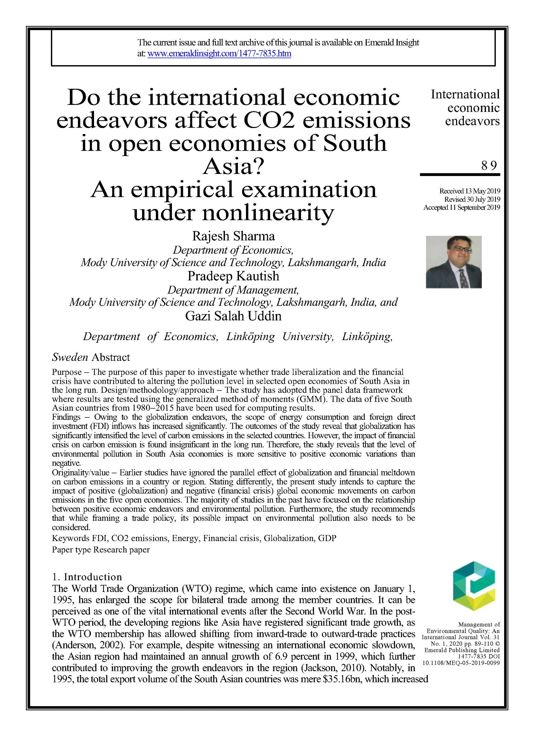 Do the international economic endeavors affect CO2 emissions in open economies of South Asia? An empirical examination under nonlinearity